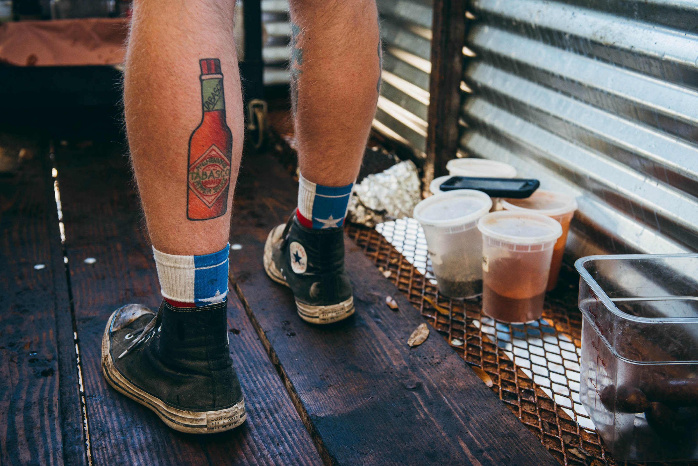 Tattoo of a Tabasco bottle on Texas Pit-master Phillip Helberg