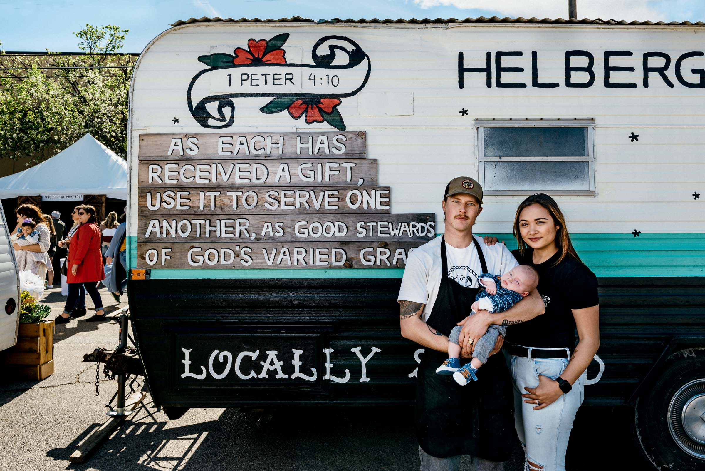 Phillip-and-Evette-Helberg-with newborn baby in front of their food truck -BBQ-Waco-Texas