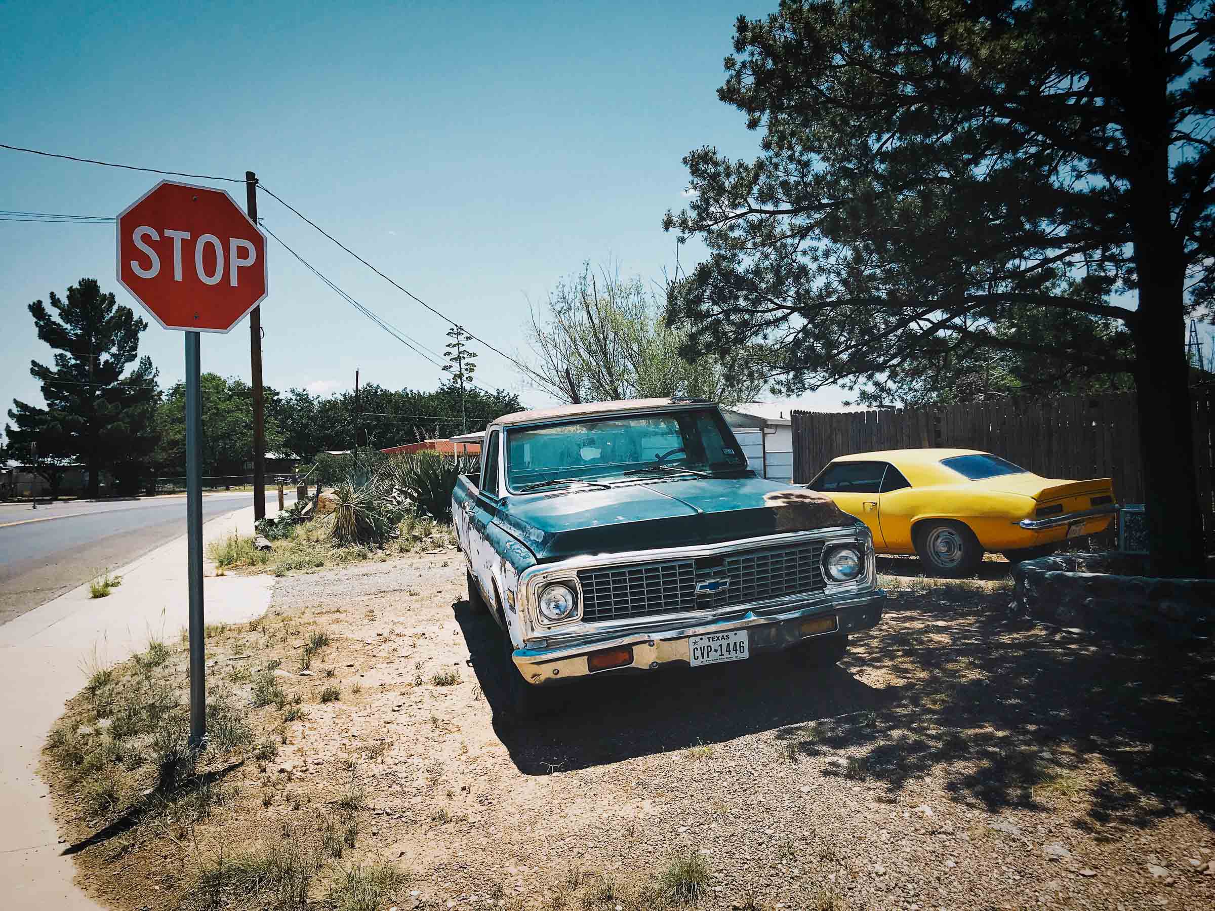 Vintage Cars, parked roadside, in Alpine TX